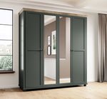 Dark green 4-door wardrobe with full-height mirror doors and paneled design, wood-effect top