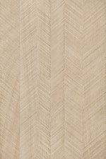 Close-up of light wood panel with herringbone-style texture