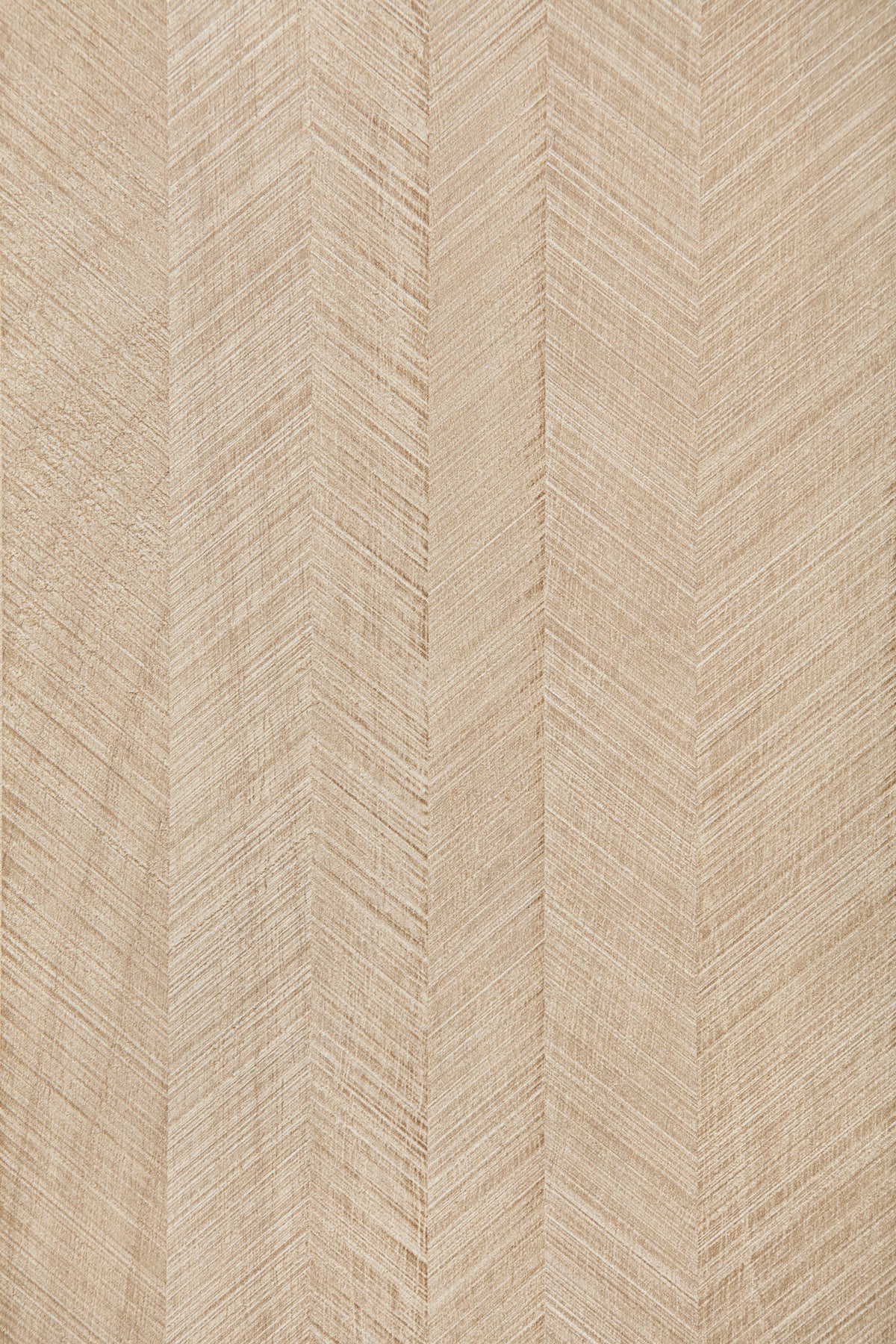 Close-up of light wood panel with herringbone-style texture