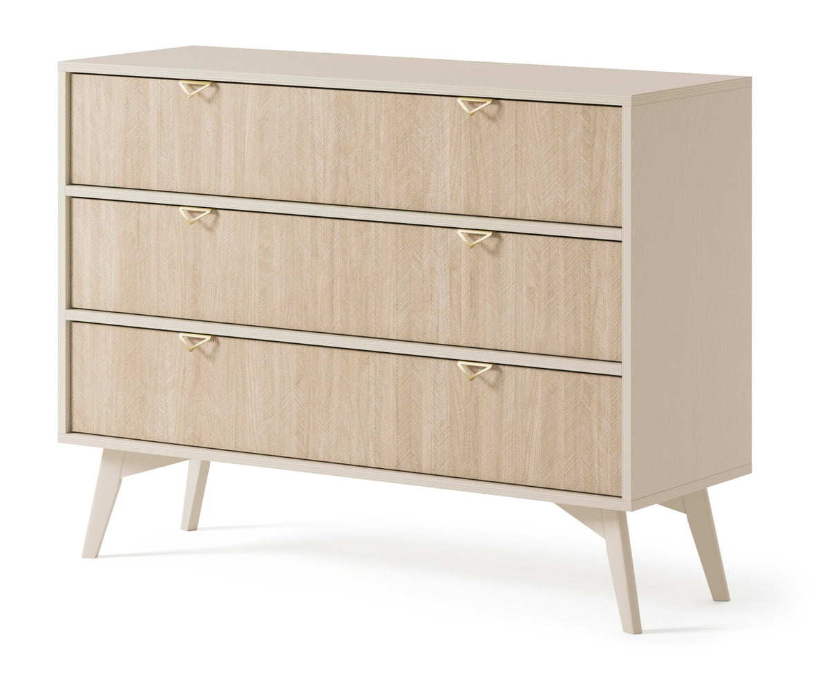 Light wood chest of drawers with three drawers, gold handles, angled side profile
