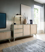 Wals 2-door sideboard with two-door base and drawers, light wood-effect finish and gray-green legs