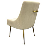 Cream ribbed upholstered accent chair with brass bar detail and tapered metal legs