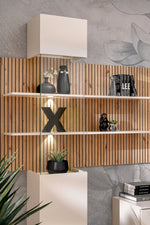 Wood slat media wall with open shelves, white cabinet, and integrated lighting