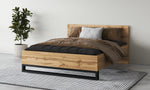 Alin bed frame with light oak headboard and black base, with pillows and quilt