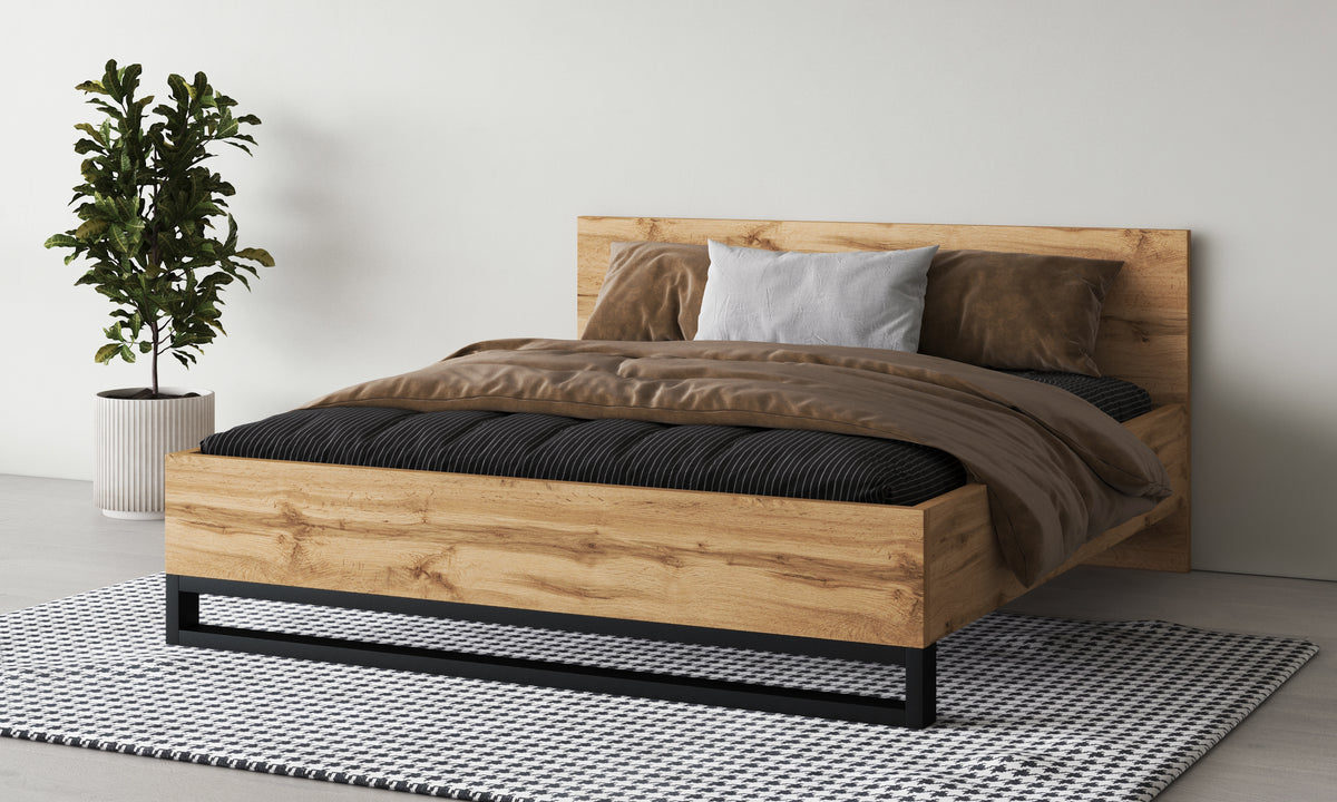 Alin bed frame with light oak finish, black base, styled bedding and throw