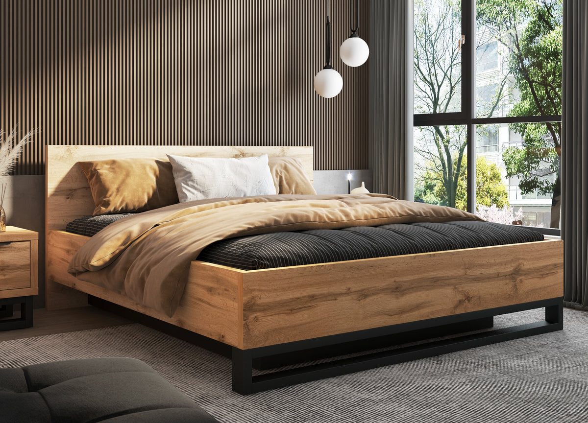 Alin bed frame with light oak slats and black base, dressed with pillows and duvet