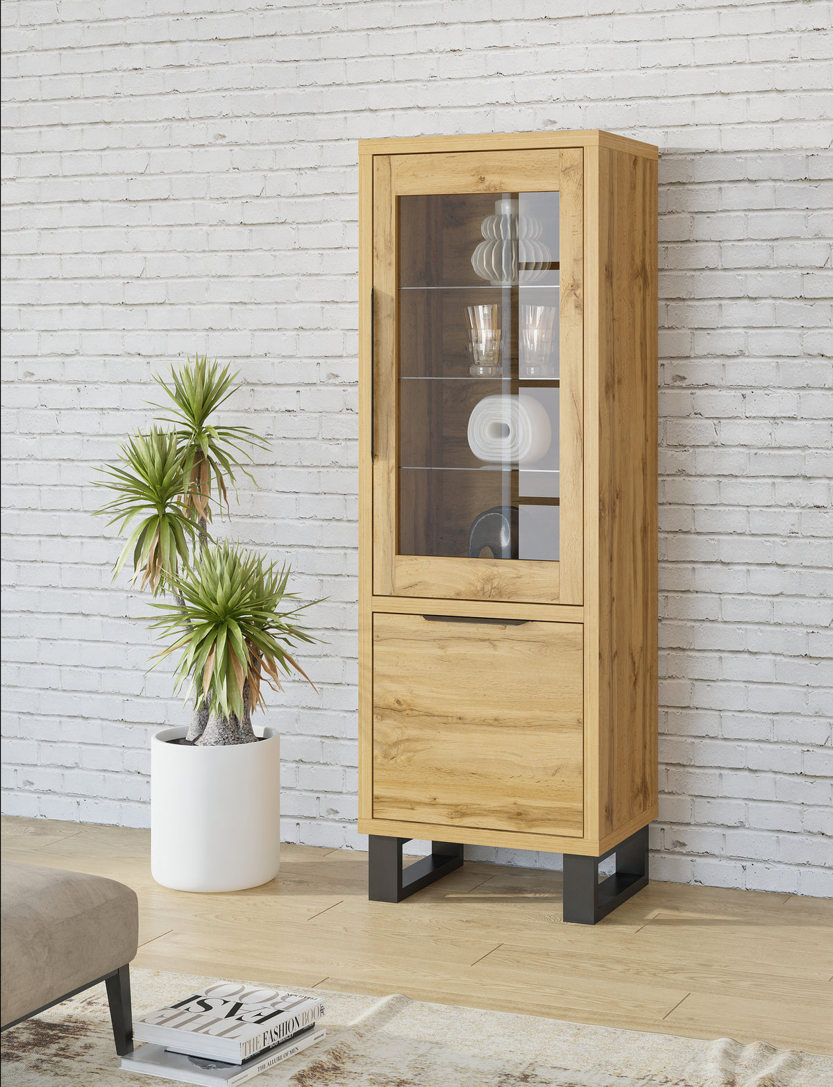 Tall slim wood display cabinet with glass door panels and dark metal feet