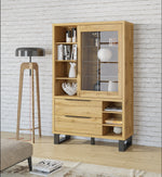 Oak-toned display cabinet with glass door, open shelves, and two drawers