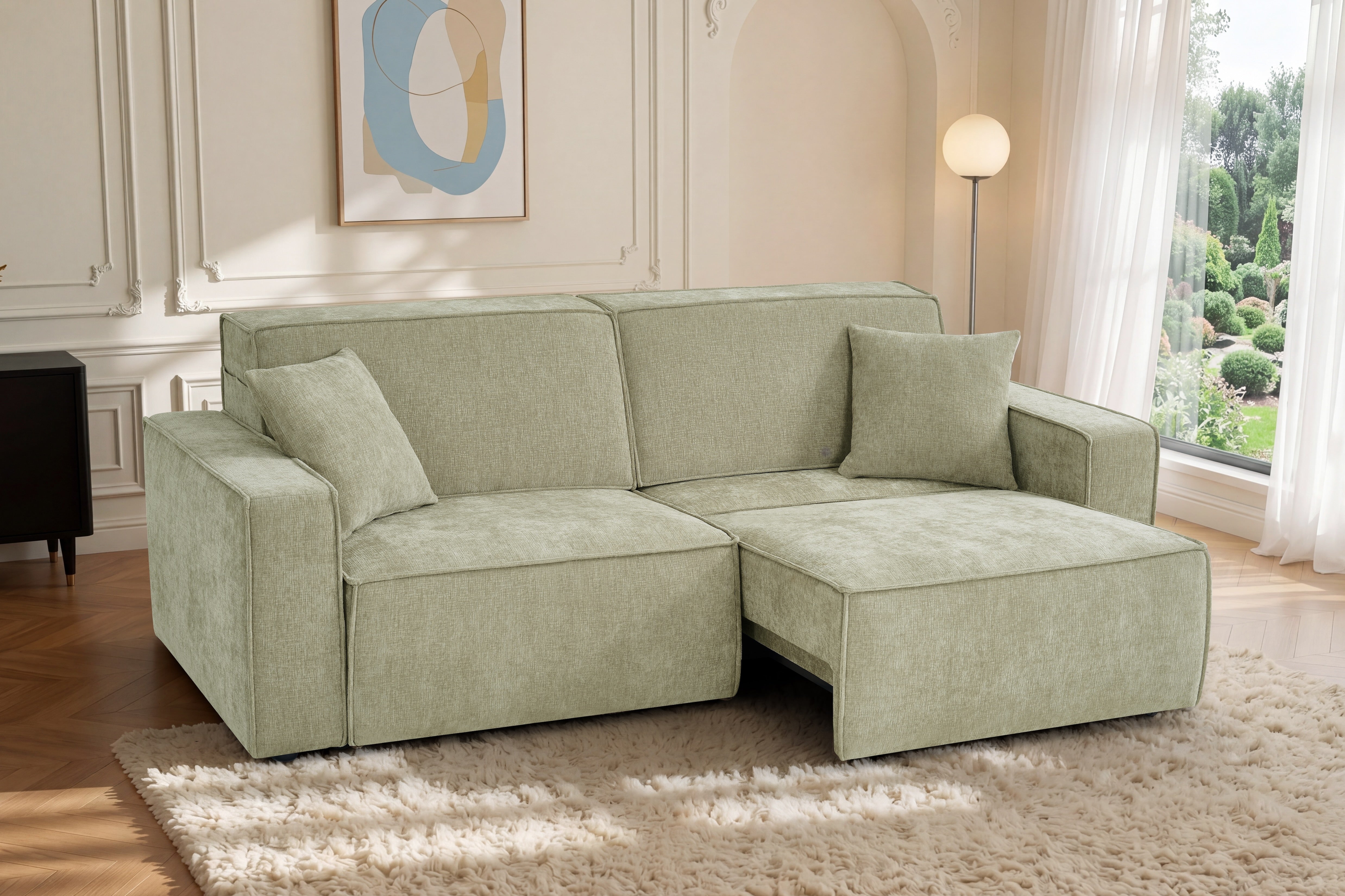 Green 3-seater sofa bed with chaise extension and square armrests, soft fabric upholstery.