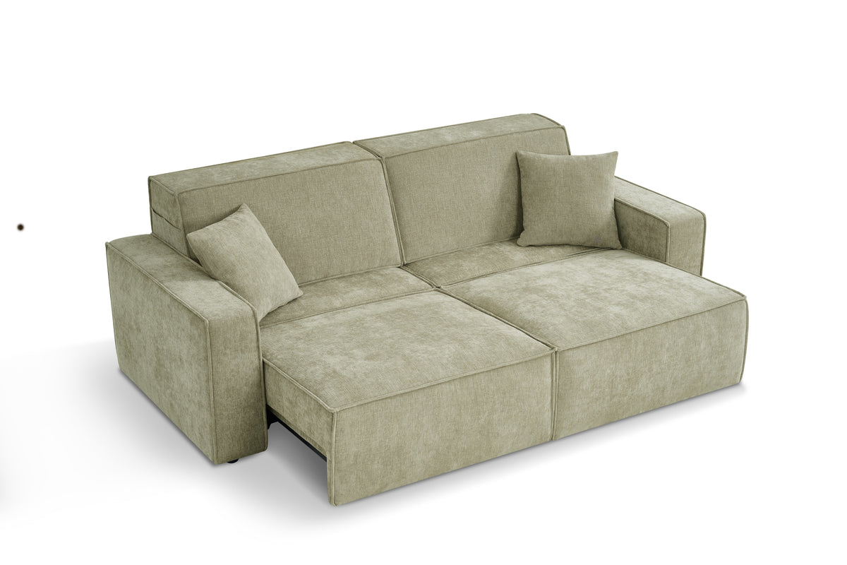 Green 3-seater sofa bed pulled out into a bed, with chaise seat and throw pillow.