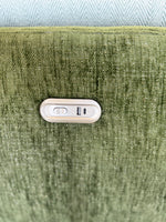 Green sofa upholstery with built-in electric control switch panel
