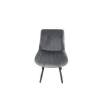 Grey velvet upholstered accent chair with rounded back and black four-leg base