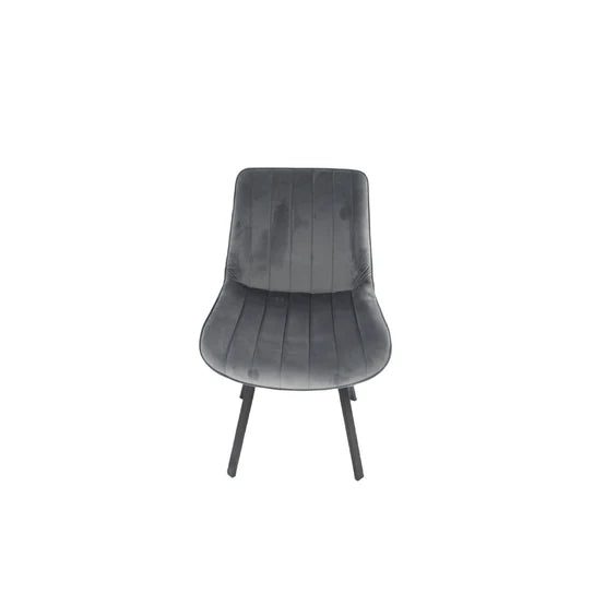 Grey velvet upholstered accent chair with rounded back and black four-leg base