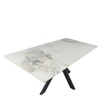 Marble-pattern ceramic table with black legs and wide light rectangular surface