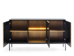 Black sideboard with three doors open, showing shelves and warm-lit central cabinet