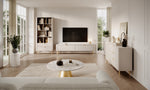 Beige TV cabinet with two ribbed doors and gold-toned trim handles