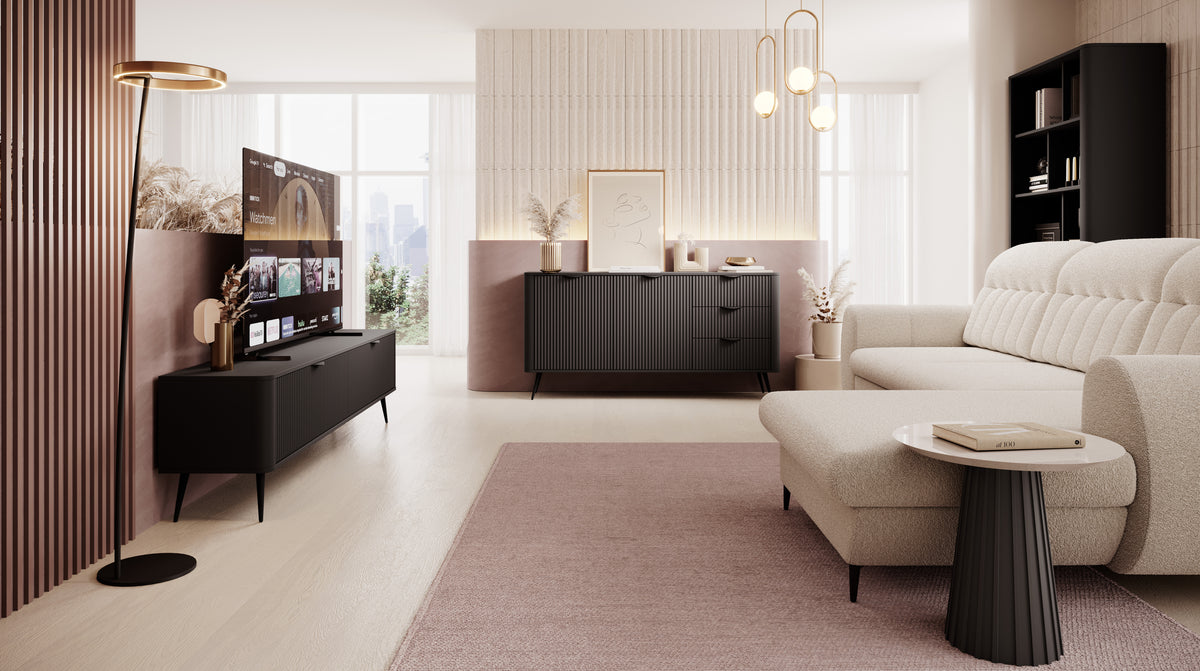 Black TV cabinet with two ribbed drawer fronts and tapered wooden legs