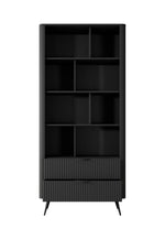 Black bookcase with open shelves and ribbed front panel on the lower section