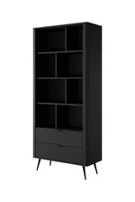 Black tall bookcase with open storage and ribbed drawer-style lower cabinet