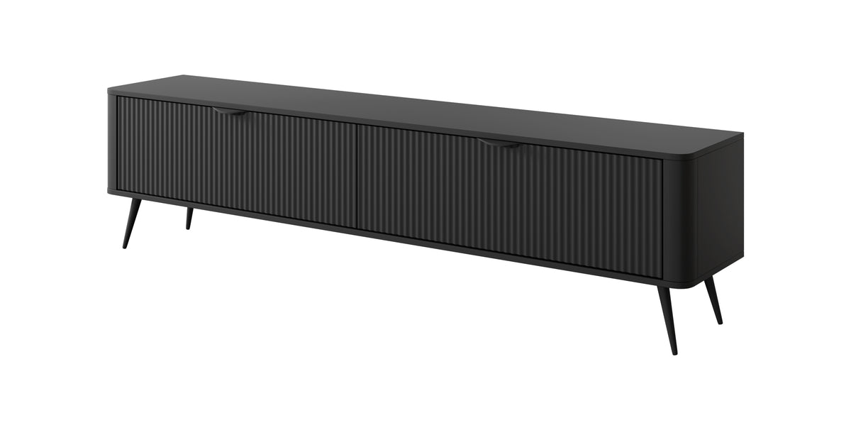 Black TV cabinet with ribbed paneling and long drawer front