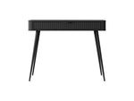 Black dressing table with ribbed drawer front and slim tapered wooden legs