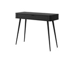 Black dressing desk with ribbed front drawer panel and angled tapered legs