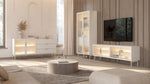 White TV cabinet with open shelving and warm LED-lit glass doors.