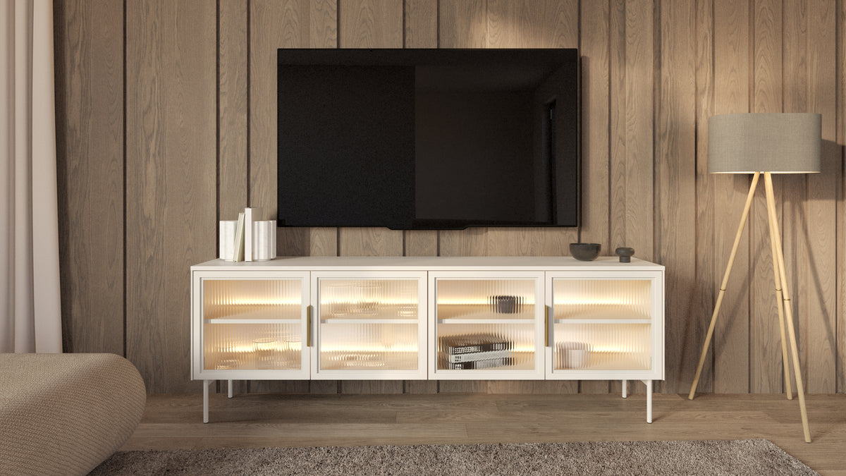 White TV cabinet with warm LED-lit glass doors and open interior shelves.