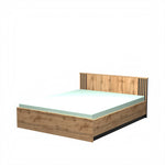 Wood-look ottoman storage bed with paneled headboard and teal upholstered top
