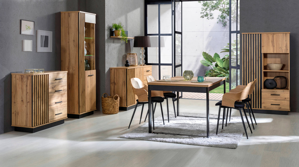 Rectangular dining table with medium-brown wood top and black metal legs in dining setting