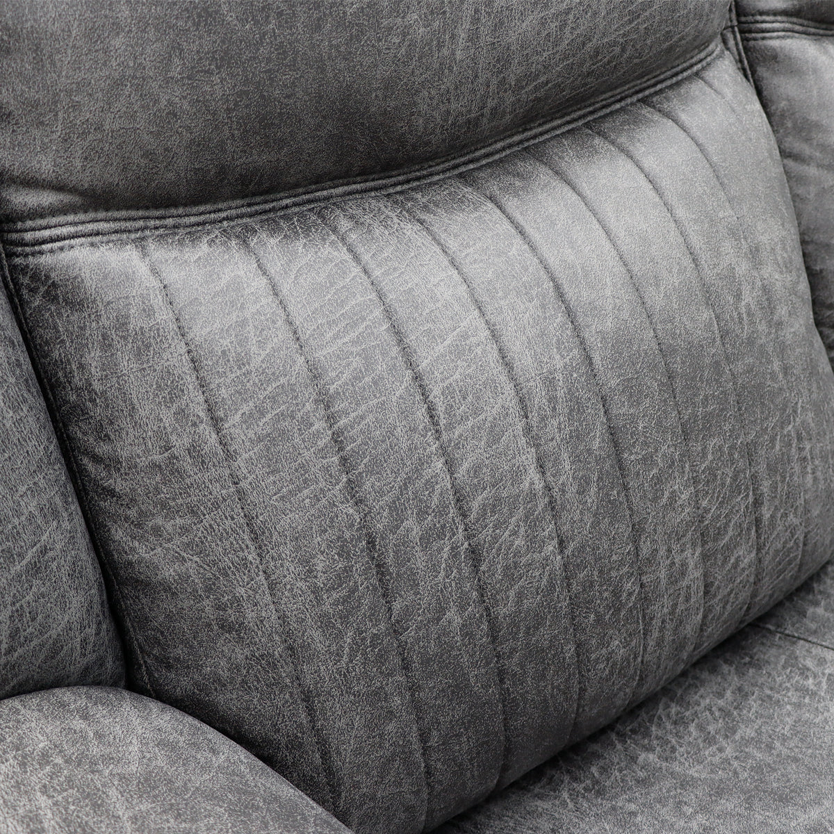 Gray upholstered armchair back panel with stitched vertical channeling