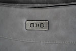 Dark gray recliner control panel with buttons on the sofa arm