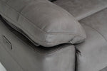 Dark gray recliner seat with padded footrest and visible seam stitching