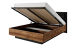 King ottoman storage bed with open lifting top and slatted mattress support, wood frame visible