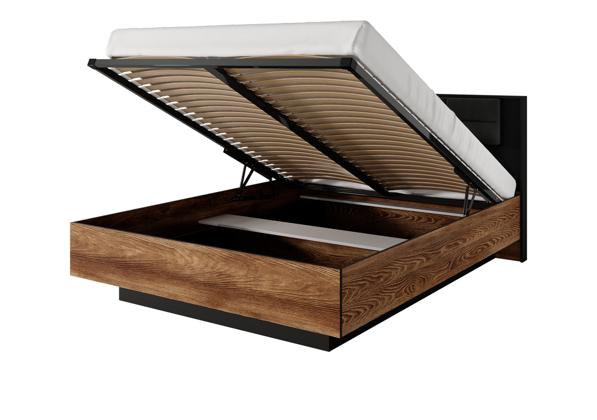King ottoman storage bed with open lifting top and slatted mattress support, wood frame visible