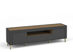 Dark gray TV cabinet with wood top, ribbed side doors, and gold pull handles
