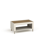 White coffee table with wood-look top, open shelf, and brass-toned feet