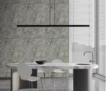 Grey marble-effect wall panel board with subtle gold veining, shown on a wall