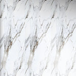 Close-up white marble-effect wall panel with thin gray and gold veining