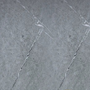 Grey marble-effect wall panel close-up with white veining lines