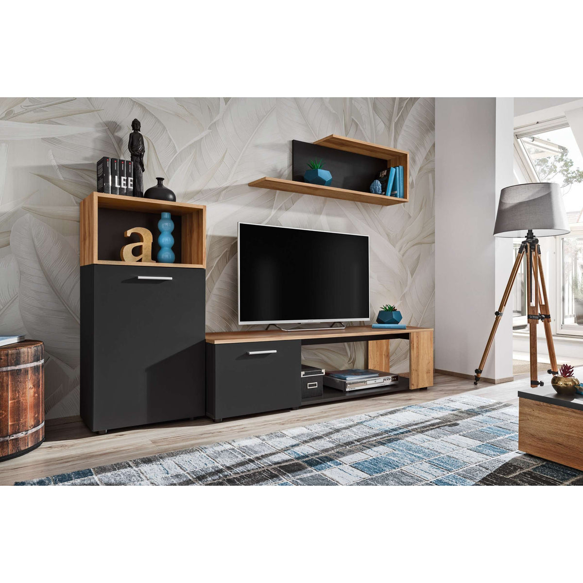 Black and wood media wall unit with TV shelf and two drawer cabinets