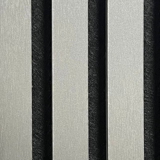 Textured metallic dark grey acoustic panel surface with vertical ribbed strips