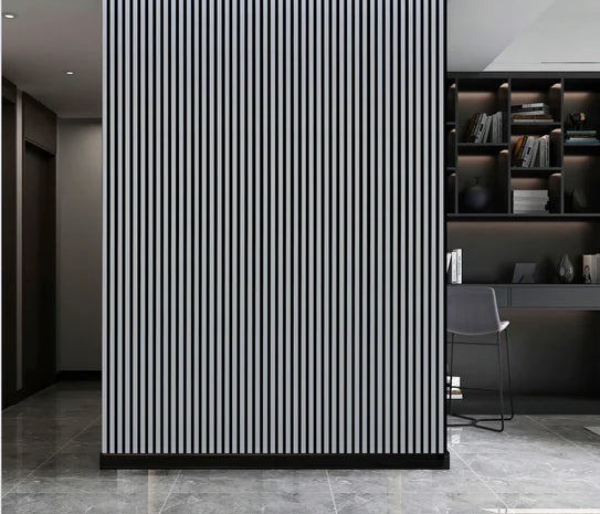 Acoustic wall panel with vertical black slats on metallic light grey backing