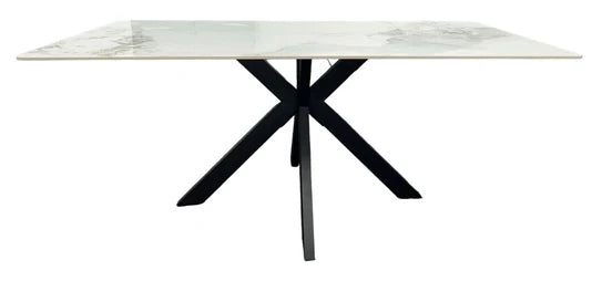 Marble-pattern ceramic table with black crossed legs and flat rectangular tabletop