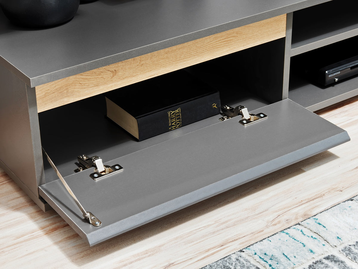 TV wall unit lower compartment with metal bracket mounts and light wood inner shelf