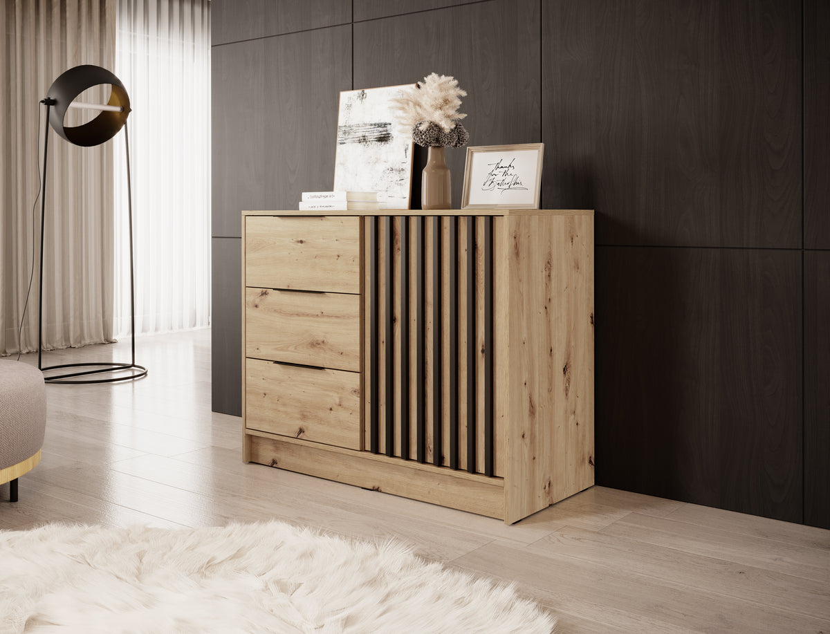 Light oak chest of drawers with three drawers and vertical black slat door panel