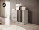 Grey chest of drawers with three pull-out drawers and vertical slatted cabinet door panel