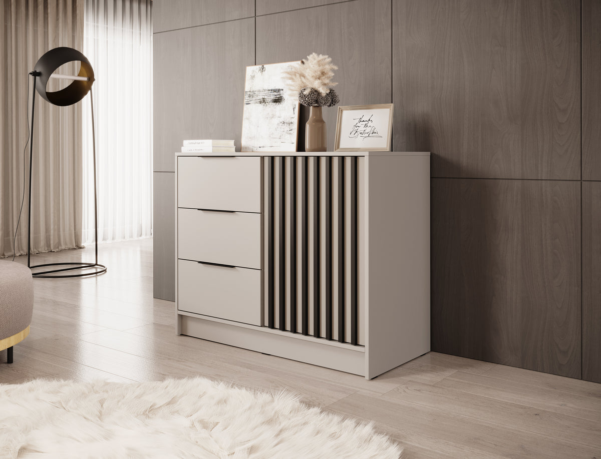 Grey chest of drawers with three pull-out drawers and vertical slatted cabinet door panel