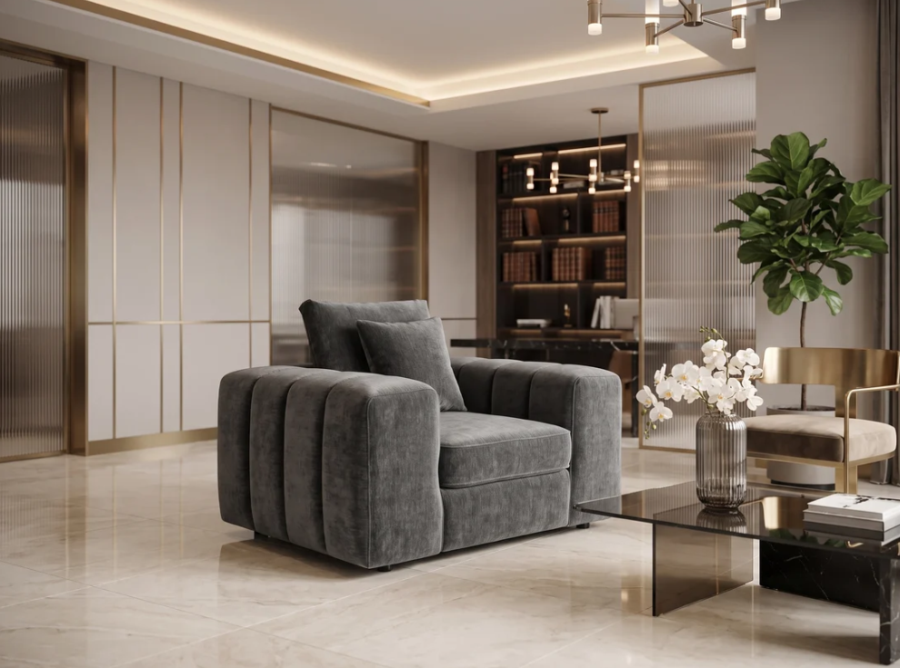 Dark gray velvet armchair with boxy arms and padded seat, tufted back cushions