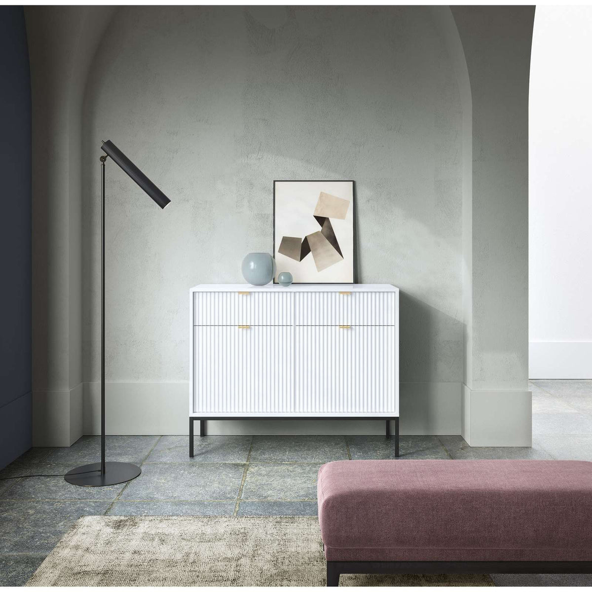 Black sideboard with 2 drawers and 2 slatted doors, gold handles, metal legs
